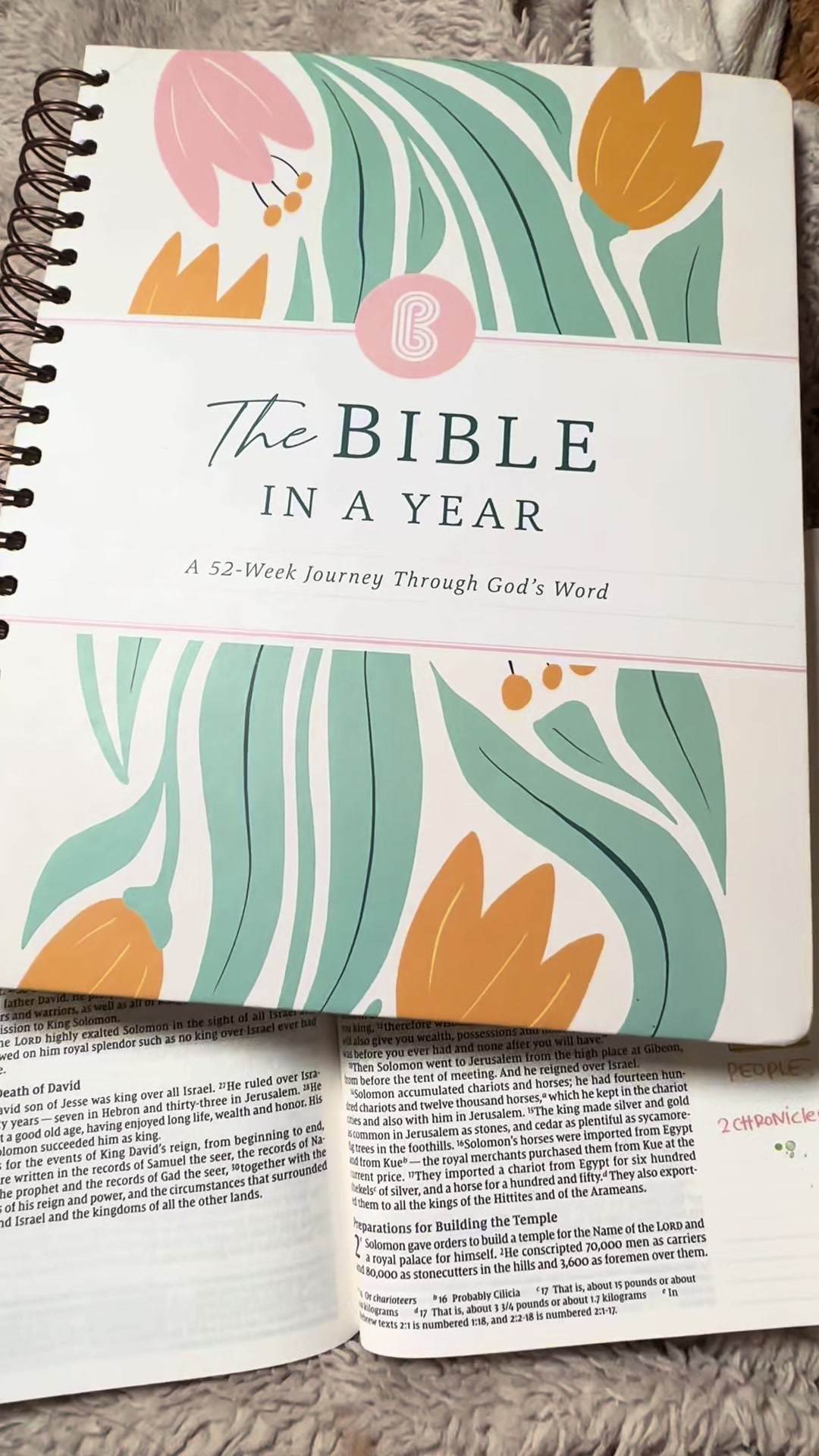 TikTok post by @britty.finds for Spiral Bible. Caption reads: [...] my Bible in a Year routine with my spiral....