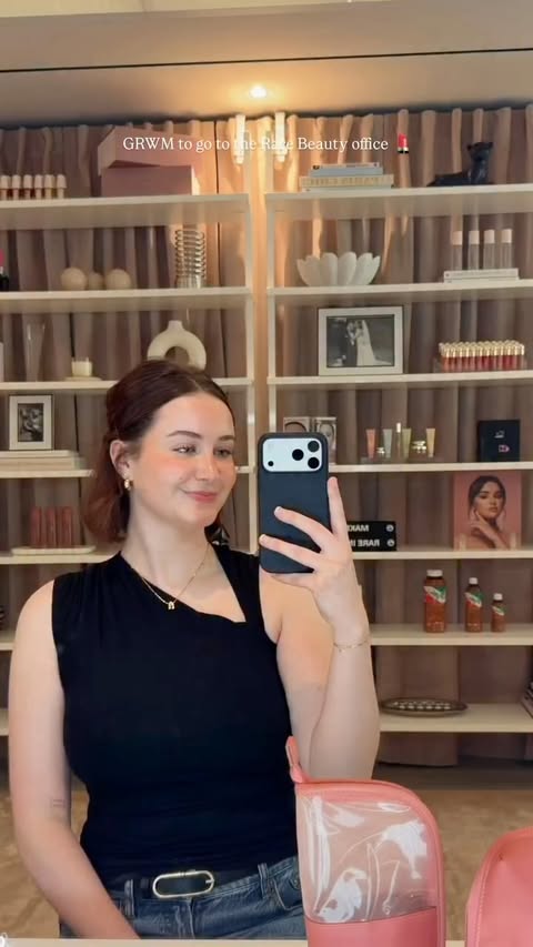 Instagram post by @youglowgrrl for Glossier. Caption reads: Grwm to go to the @rarebeauty office 💄

Products....