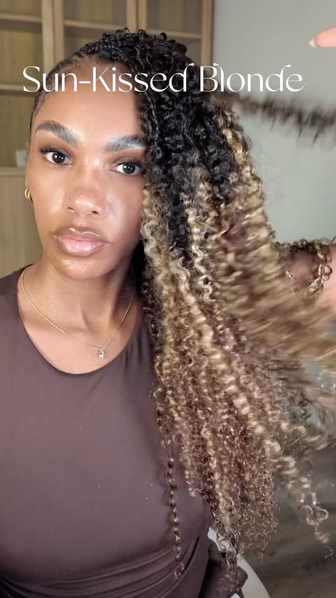 Instagram post by @dominiquerhnee for QVR Hair. Caption reads: Sun-kissed crochet hair. Hair linked in bio 🤎....