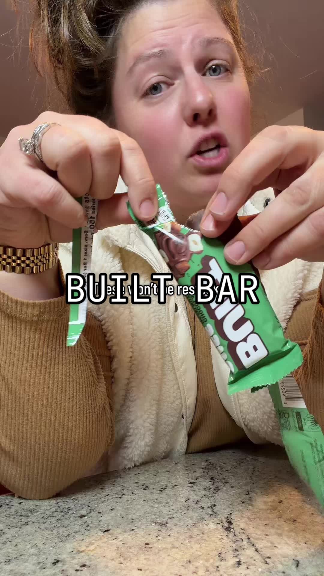 TikTok post by @regular_megan for BUILT Bar. Caption reads: Chocolate Hazelnut Puff is the last seasonal....