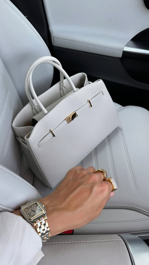 Instagram post by @cristinasurdu for DeMellier. Caption reads: Who voted for this bag 🤩? #giftedby....