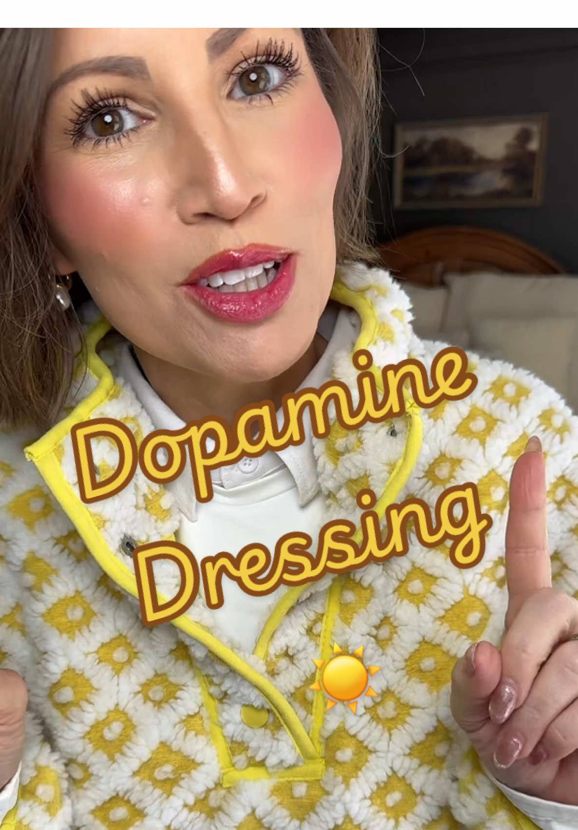 TikTok post by @lindseyky for Songling Fashion. Caption reads: Obsessed with this beautiful yellow pullover! It’s....