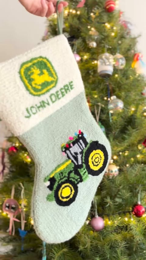 Instagram post by @byadelinewang for John Deere. Caption reads: The stockings were hung on the JD with care.