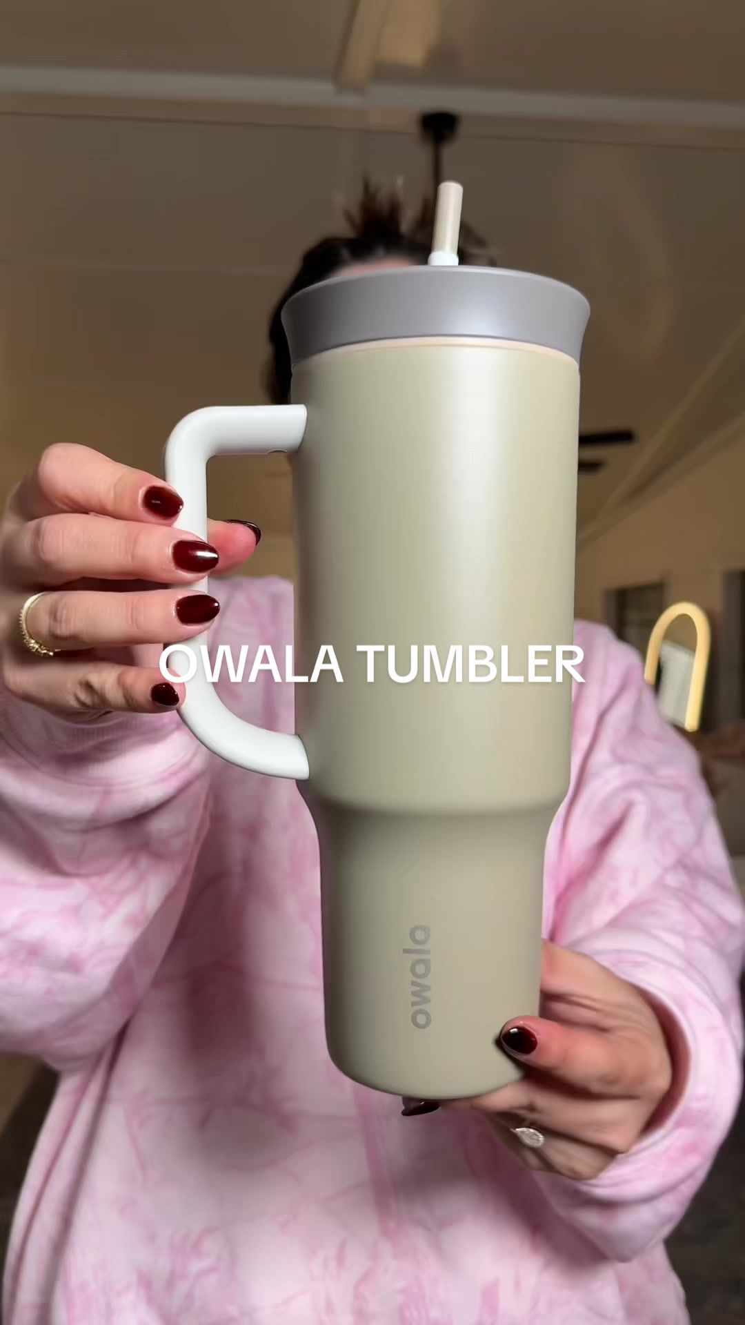 TikTok post by @chantlycaree for Owala. Caption reads: @Owala 🤌🏼 #tiktokshoprestock [...].