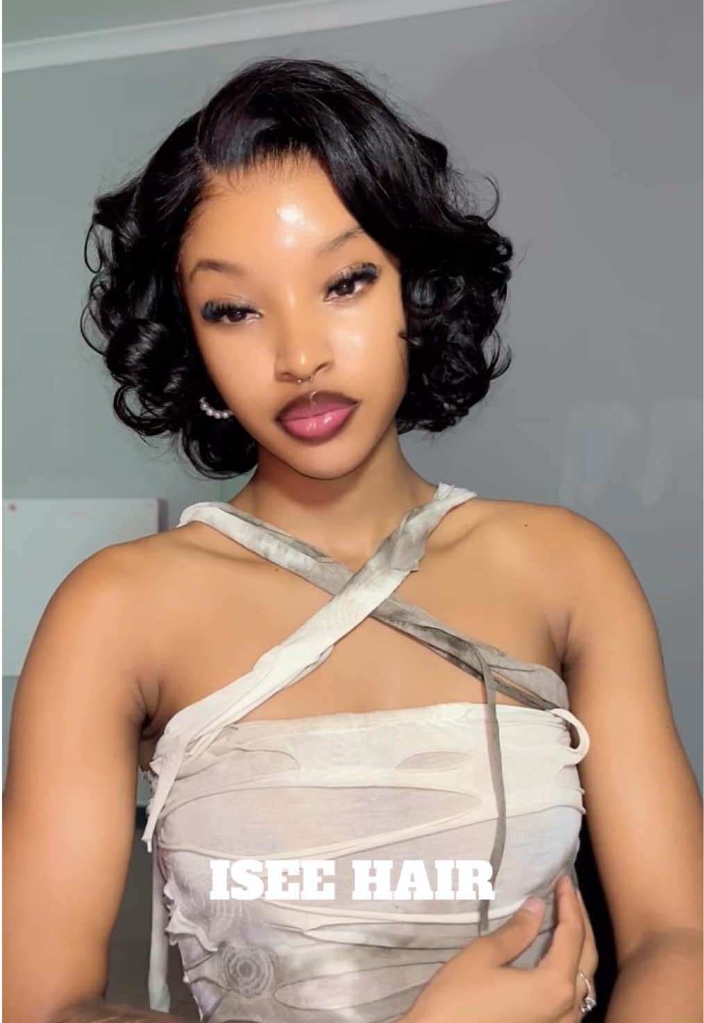 TikTok post by @tlotli.underscore for iseehair. Caption reads: Link in my bio🥰@ISEEHAIR #vintageblowout #blowout....