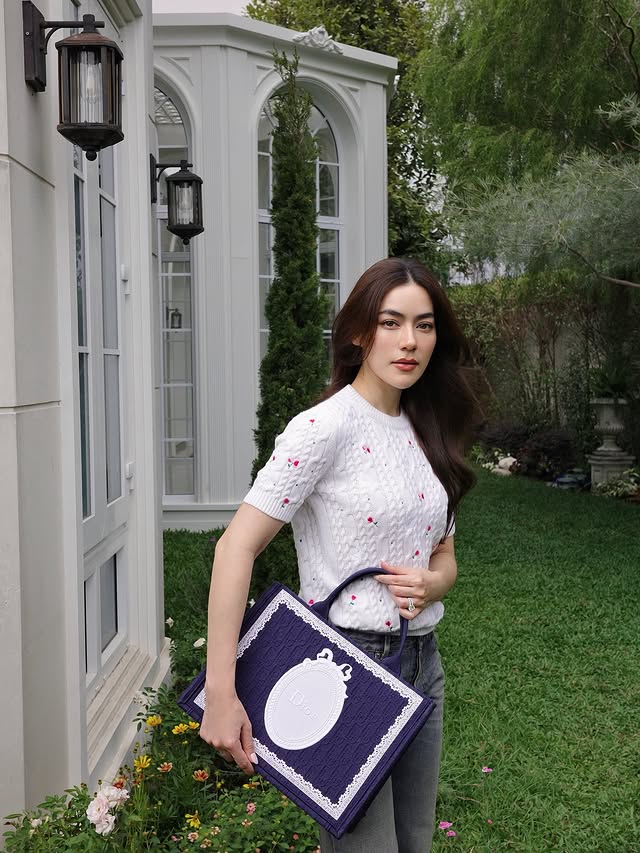Instagram post by @kimmy_kimberley for Dior. Caption reads: 🌷🪻🎀🌻🍃 @dior #diorss26.