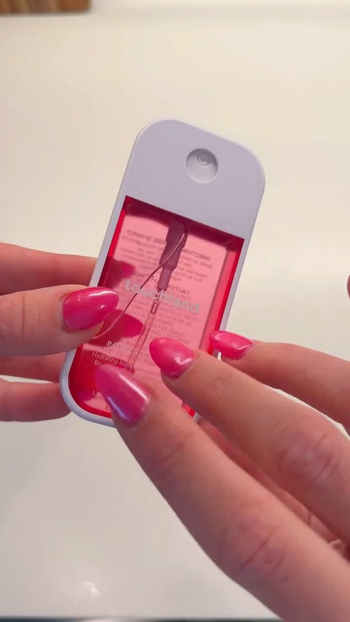 Instagram post by @askinem for Touchland. Caption reads: Comment “TOUCH” for the link! 

Let’s unbox the....