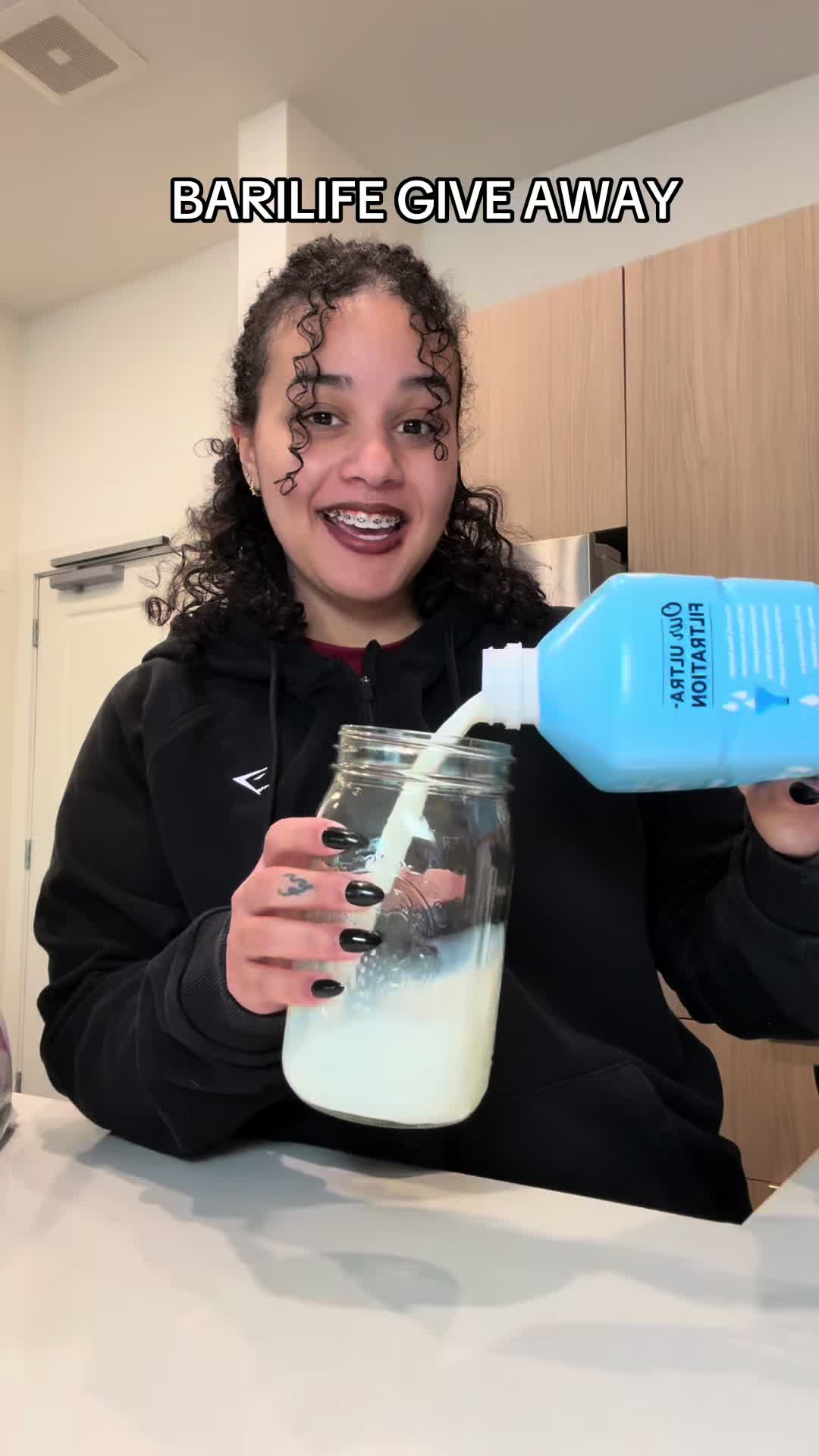 TikTok post by @josygotcurlss for Bari Life. Caption reads: @Bari Life® #giveaway #barilife.