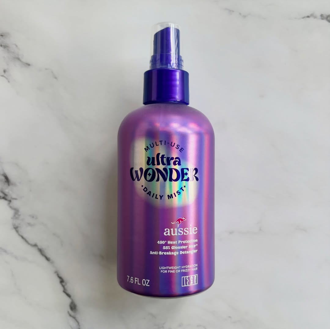 Instagram post by @reviewsbysunny for Aussie Hair. Caption reads: [...] that I know and love! @influenster....