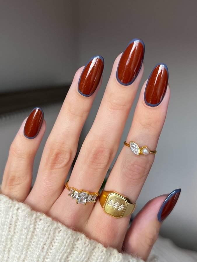 Instagram post by @finewinenails for butter LONDON. Caption reads: [...] with a denim blue twist 👖🍂🍁🥮 •....