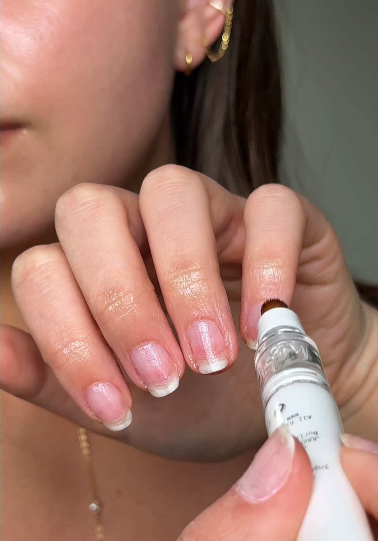 TikTok post by @aislinnfoutz for JUNOCO. Caption reads: [...] skipping nail & cuticle care again 🤍....