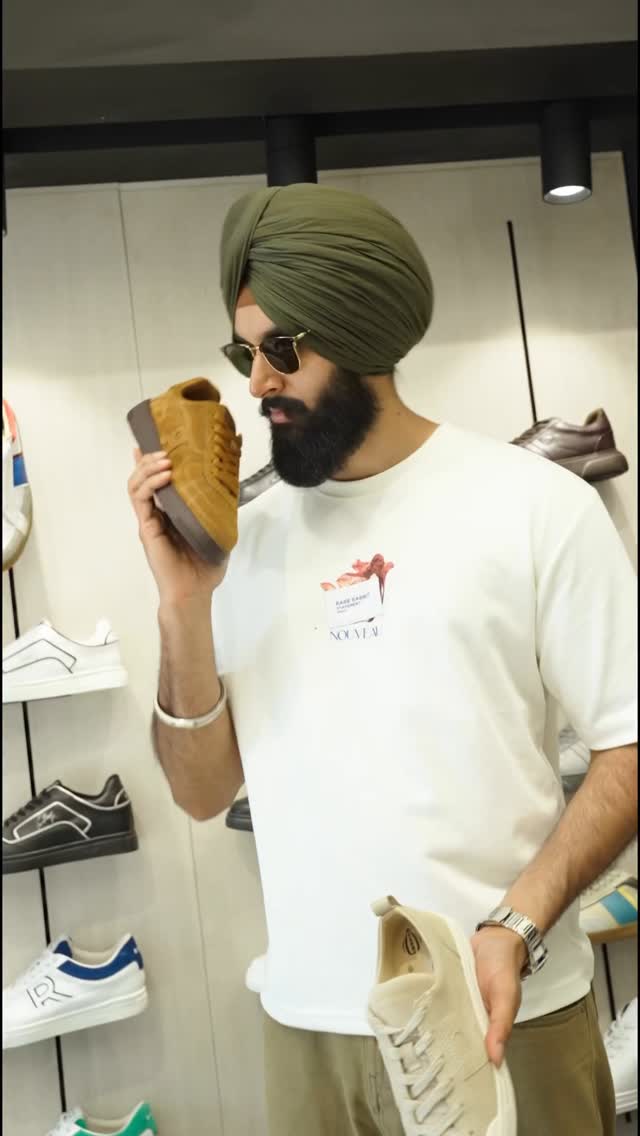 Instagram post by @aman_singhvirk for RARE RABBIT. Caption reads: Rare Rabbit steps up the game 👟 Rare’Z by Rare....