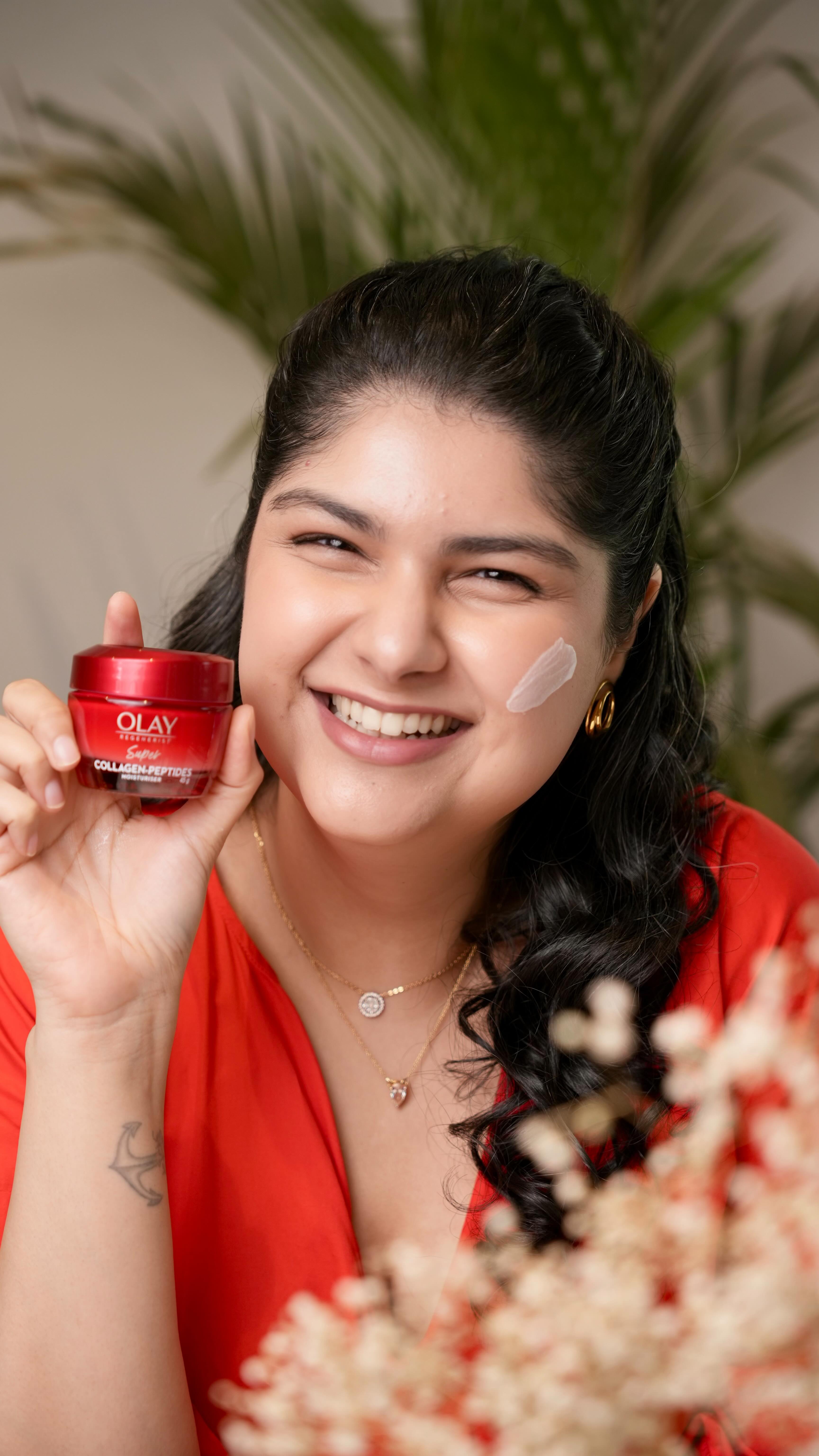 Instagram post by @anshulakapoor for OLAY. Caption reads: They say the best smiles leave a mark- and....