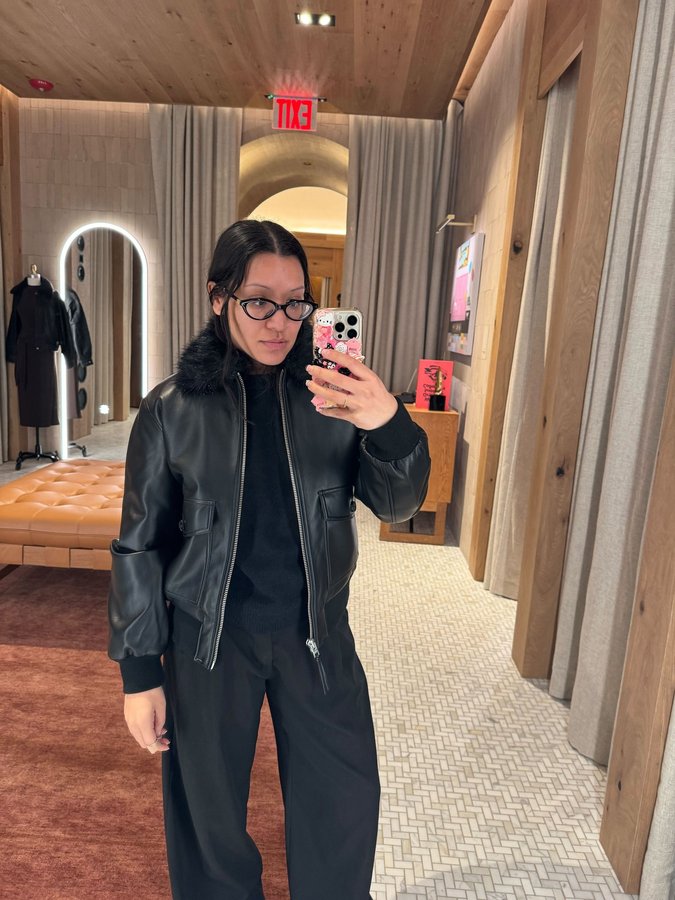 Instagram post by @danielatguevara for Who What Wear. Caption reads: @aritzia Flat Iron has officially landed! Come see....