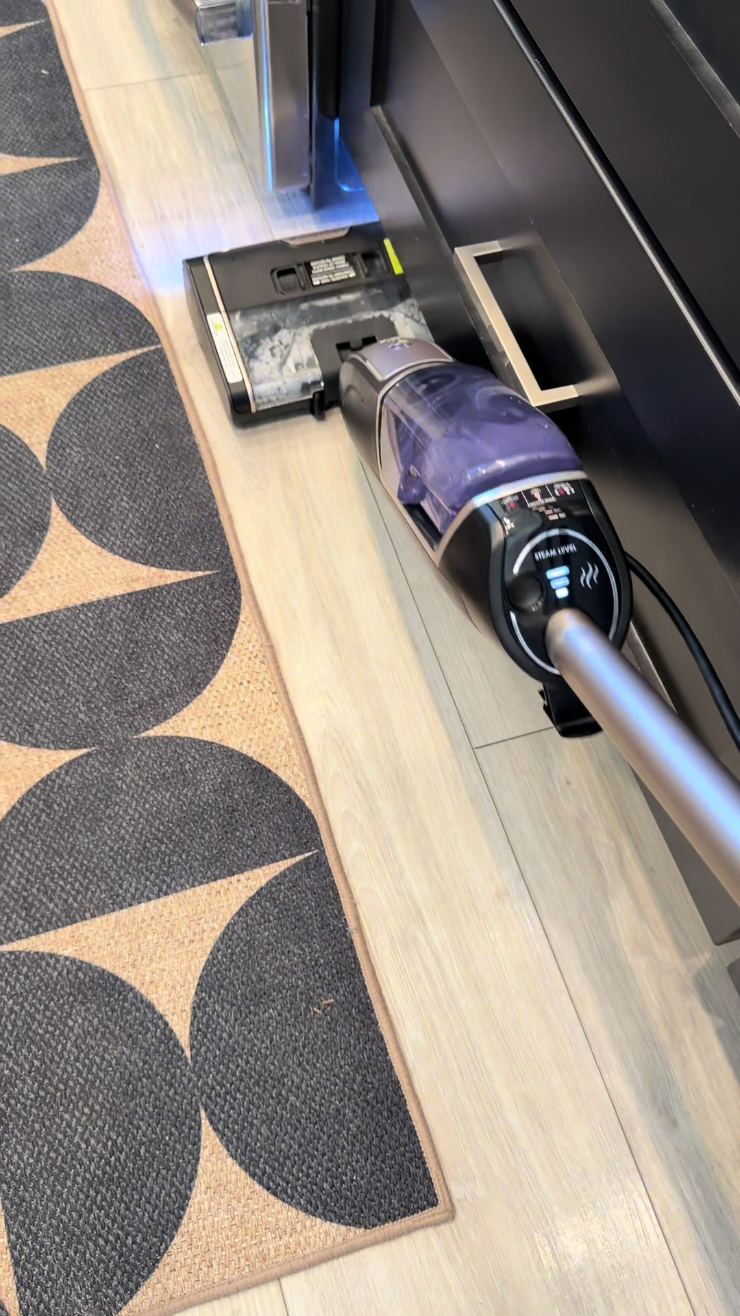 TikTok post by @that.em.2.0 for QVC. Caption reads: @QVC, Inc #SharkSteamPickUp #SpringCleaning .