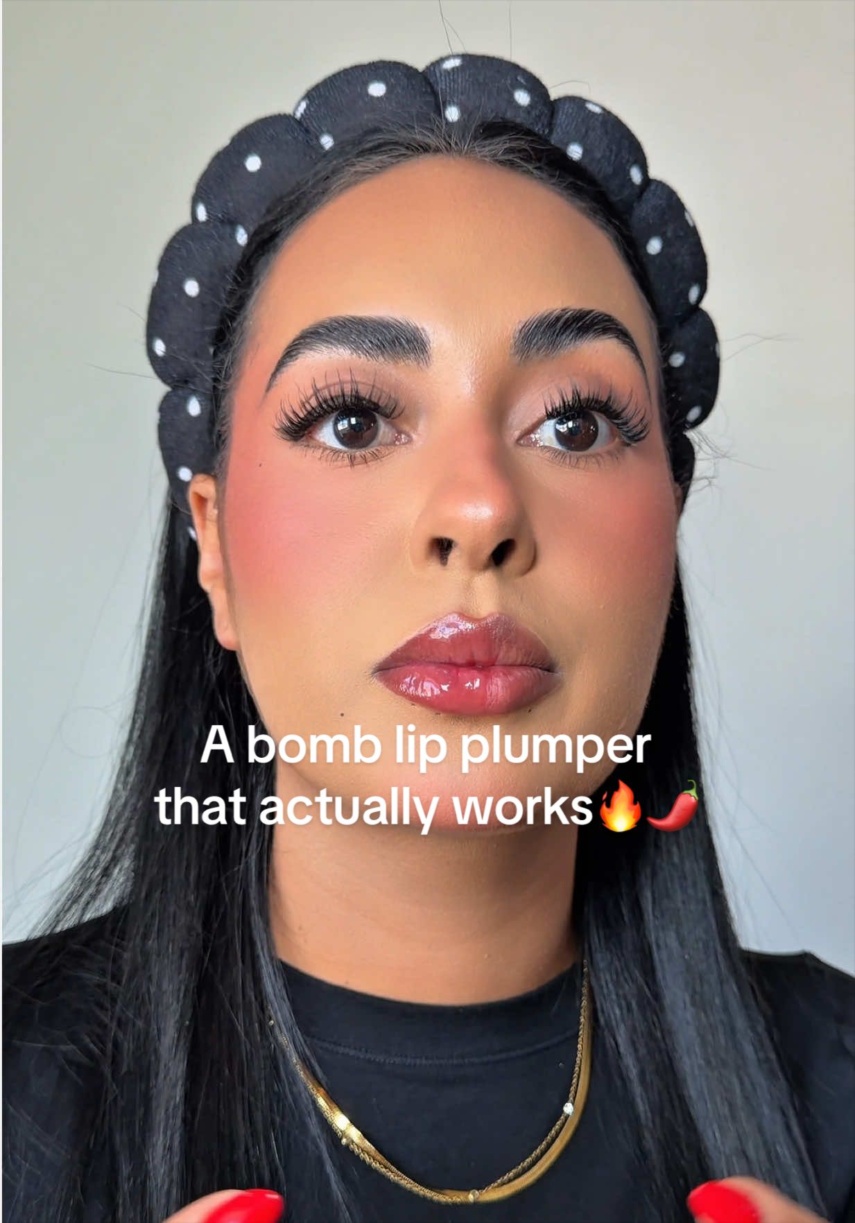 TikTok post by @angiely.goodman for LAKA. Caption reads: This lip plumper is next level good 🌶️ @Laka US....