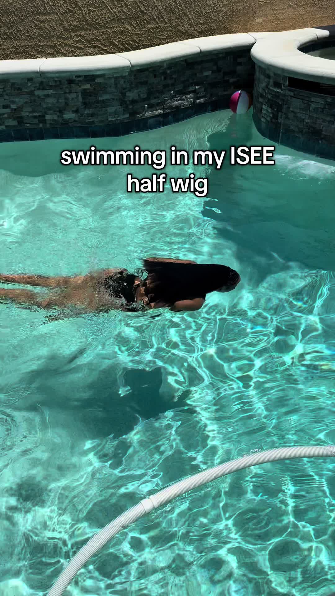 TikTok post by @brijohnson212 for ISEE HAIR. Caption reads: I love my half wig even more now! It’s waterproof....