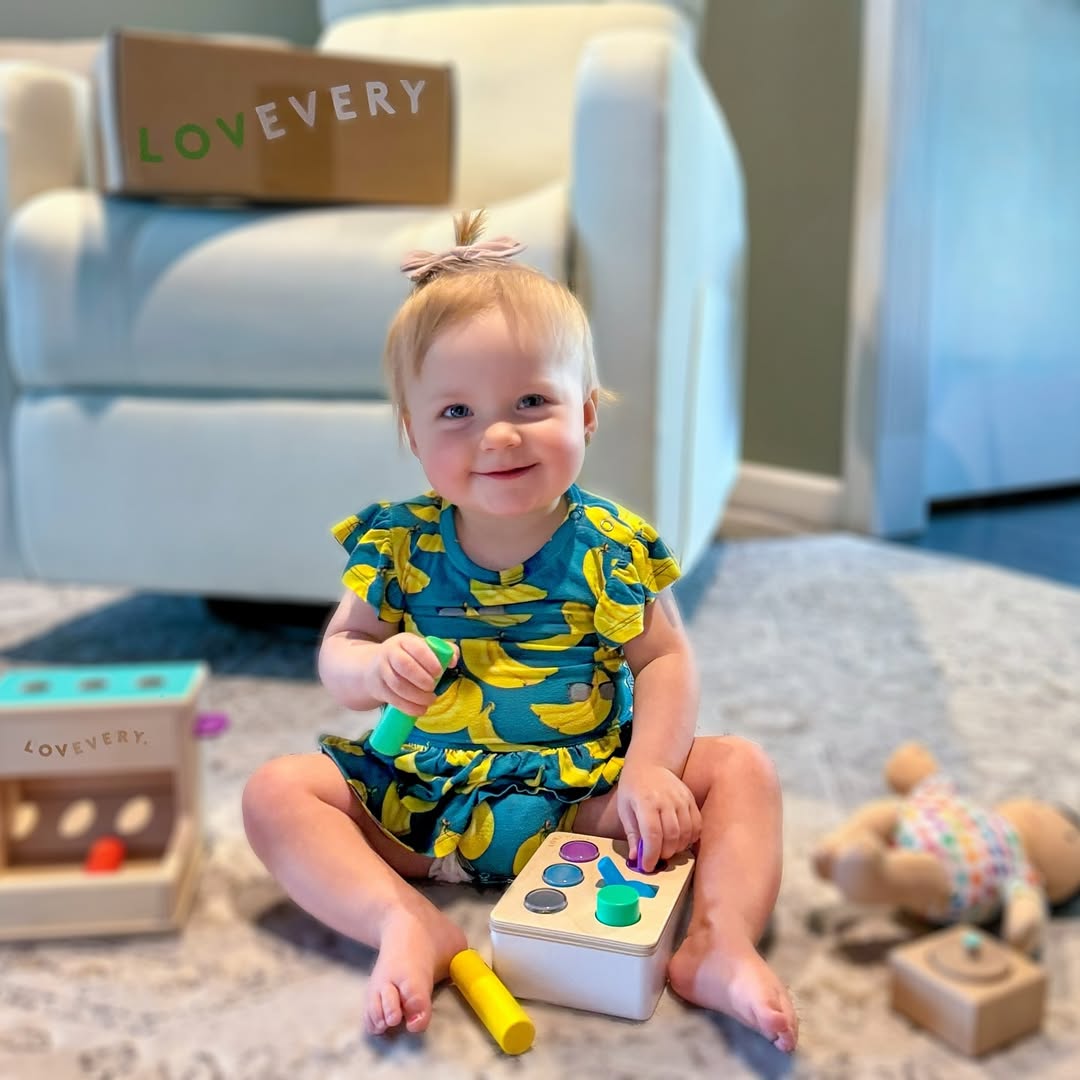 Instagram post by @dunnfamilyfun for Lovevery Europe. Caption reads: Peyton is loving The Thinker @lovevery Play Kit.....