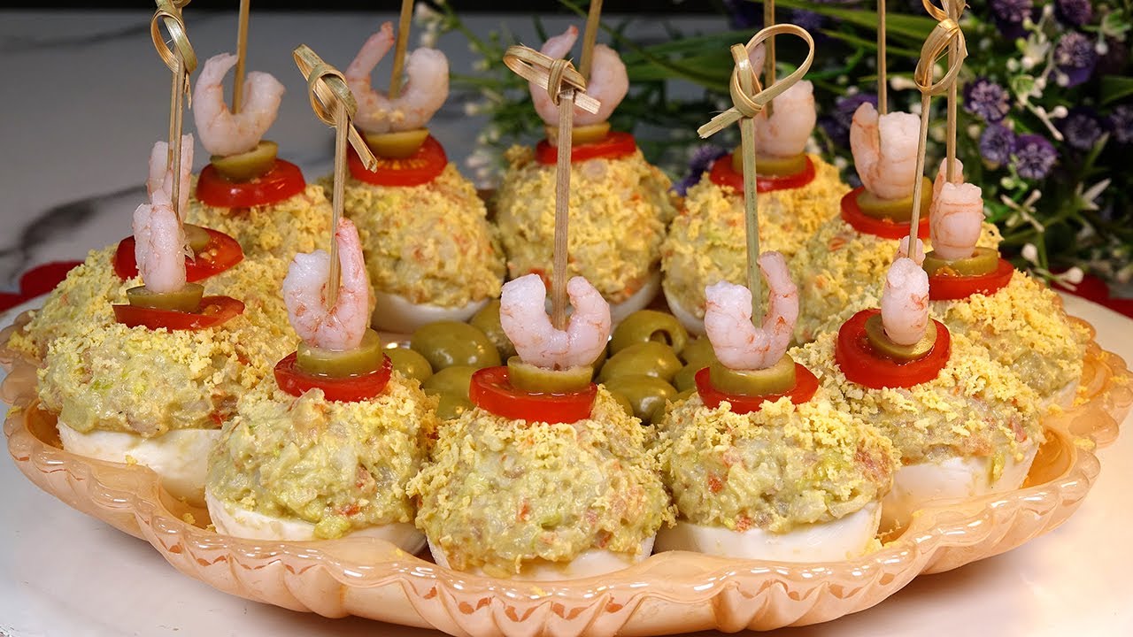 YouTube post by @LoliDominguezJimenez for Freepik. Caption reads: Easy, quick and delicious deviled eggs with shrimp....