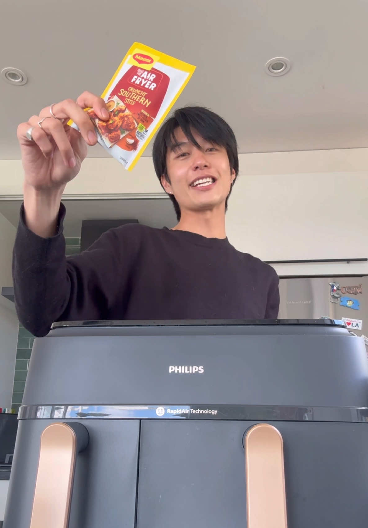 TikTok post by @eatlitfood for Philips. Caption reads: Chicken tenders made even tastier by @MaggiANZ and....