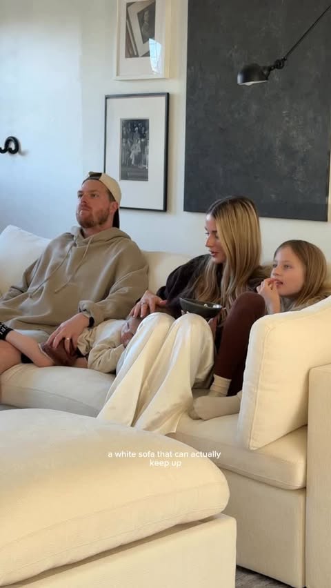 Instagram post by @theamandacannon for Cozey. Caption reads: [...] We’ve had our Ciello sofa from @cozey for a....