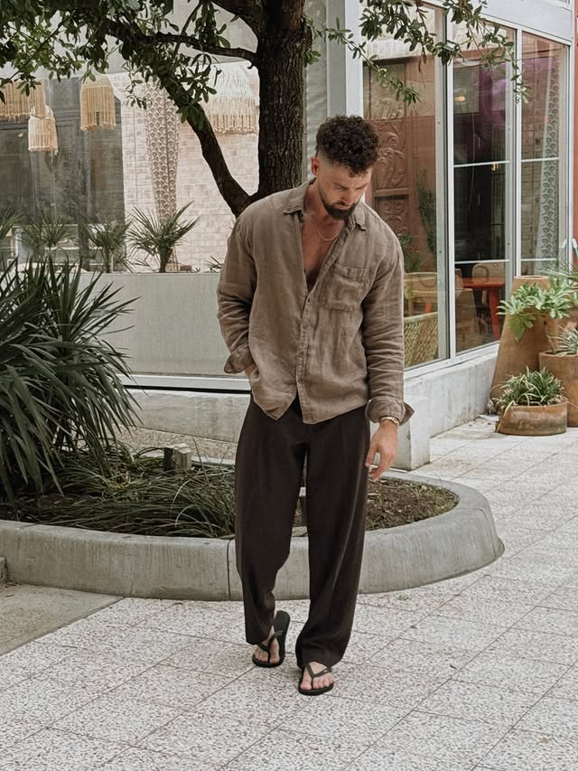 Instagram post by @dan.adkins11 for Fossil. Caption reads: [...] for summer: flip flops and @fossil. Less is....
