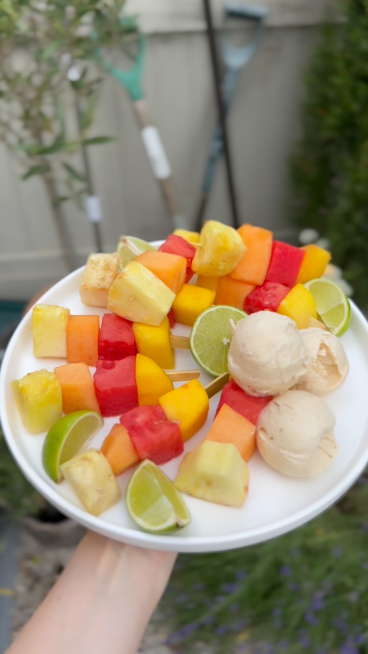 Instagram post by @tinytumsrecipes for Pip Organic. Caption reads: BBQ Fruit skewers 🍉🍓🍍🥭
I have partnered with....