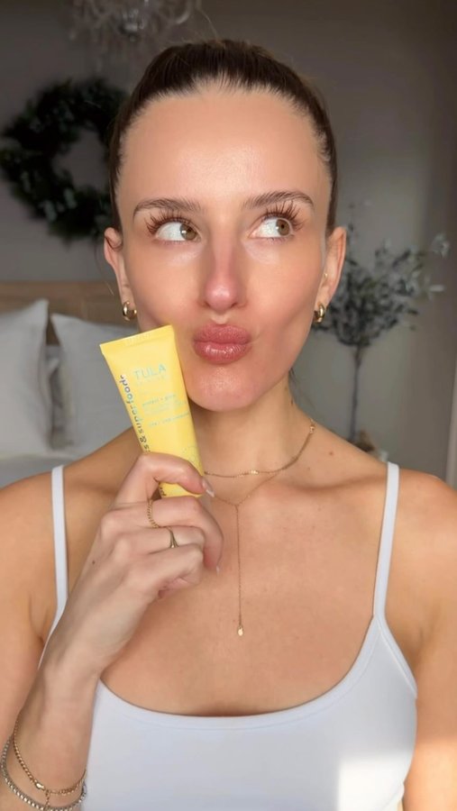 Instagram post by @juuujubee for TULA. Caption reads: #ad keeping my skin glowy and protected all summer....