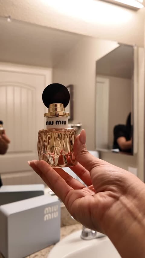 Instagram post by @litzyvaltierra for Miu Miu. Caption reads: Nothing beat smelling Good with new Miu Miu....