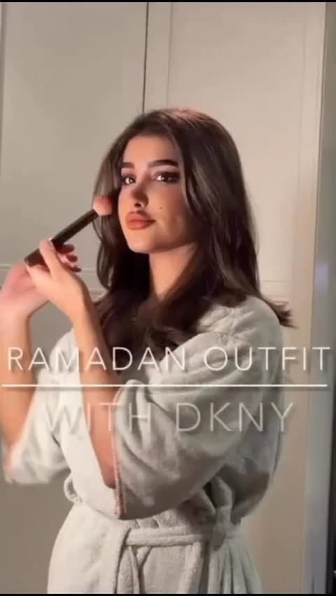 Instagram post by @maylanalsubaie for DKNY. Caption reads: [...] like more — 1 or 2? All outfits are from....