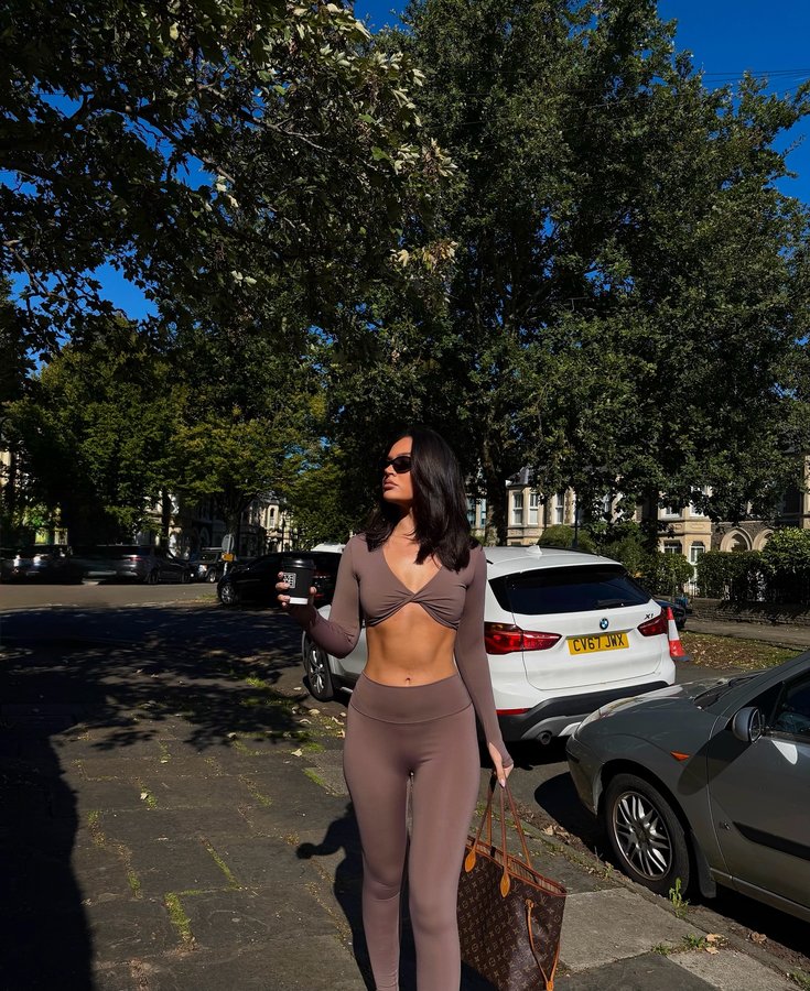 Instagram post by @emilyxmorann for Elite Eleven Sporting. Caption reads: The best mornings 🩰☕️🍂.