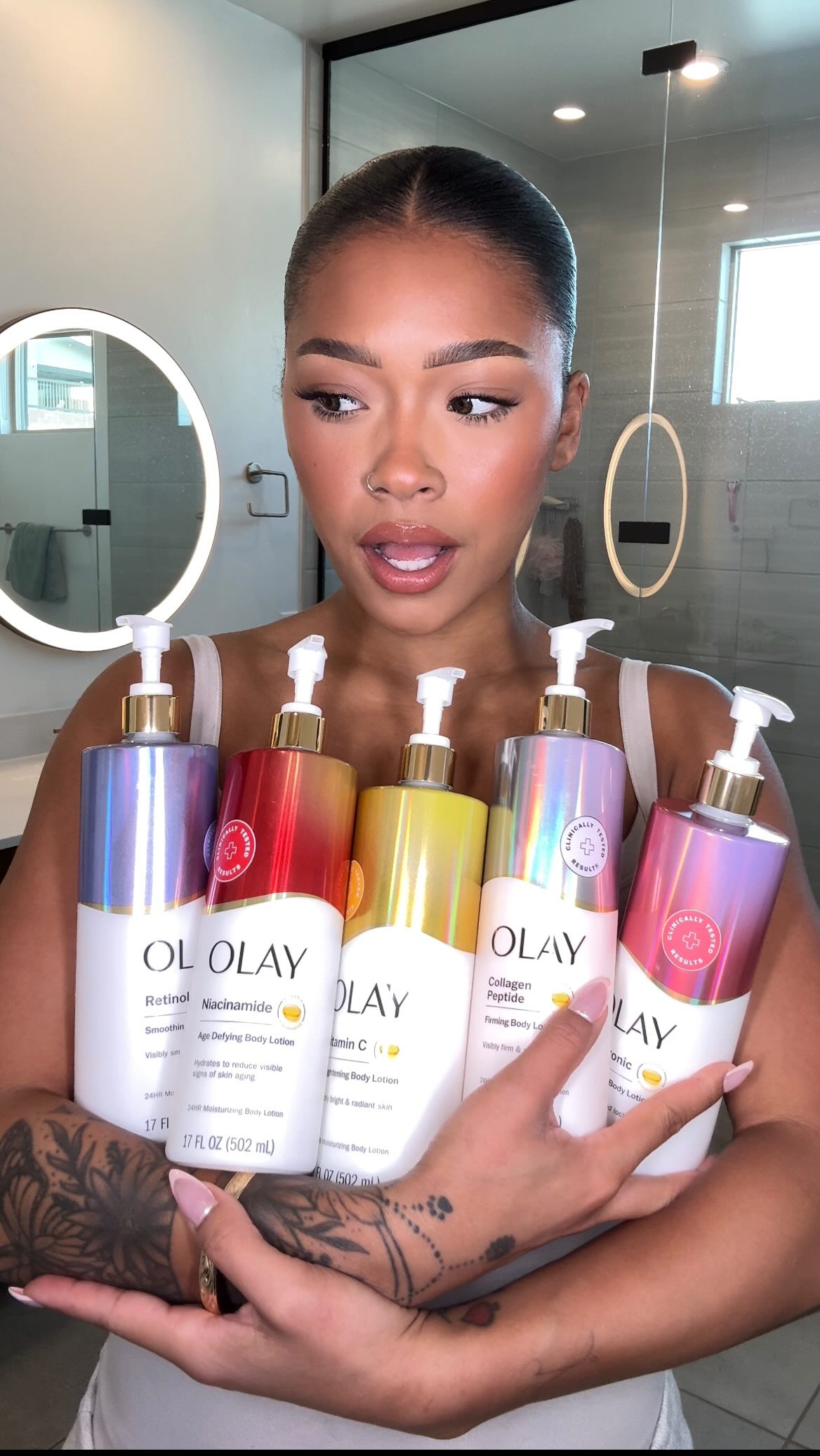 Instagram post by @leilanigreen for OLAY. Caption reads: OKAY @OLAY #ad #OlayPartner these body lotion....