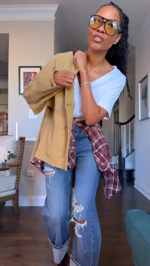 Instagram post by @staciegentry_ for 12th Tribe. Caption reads: Loving this Barn Coat from @shop12thtribe 🙌🏽....