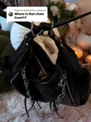 TikTok post by @amymomfinds for Iris And Rainbow. Caption reads: [...] black in stock #newbag #trendingbag....