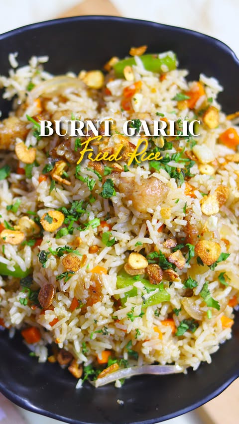 Instagram post by @tangybuds for Daawat. Caption reads: [...] Fried Rice done right 🔥🧄🍚 Made with....