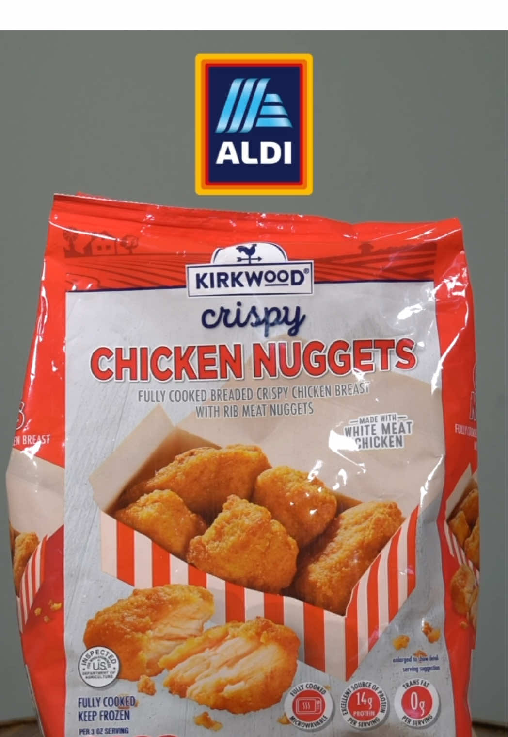 TikTok post by @aj_reviews_ for Elijah's Xtreme. Caption reads: [...] Variety Pack. #aldi #chickennuggets....