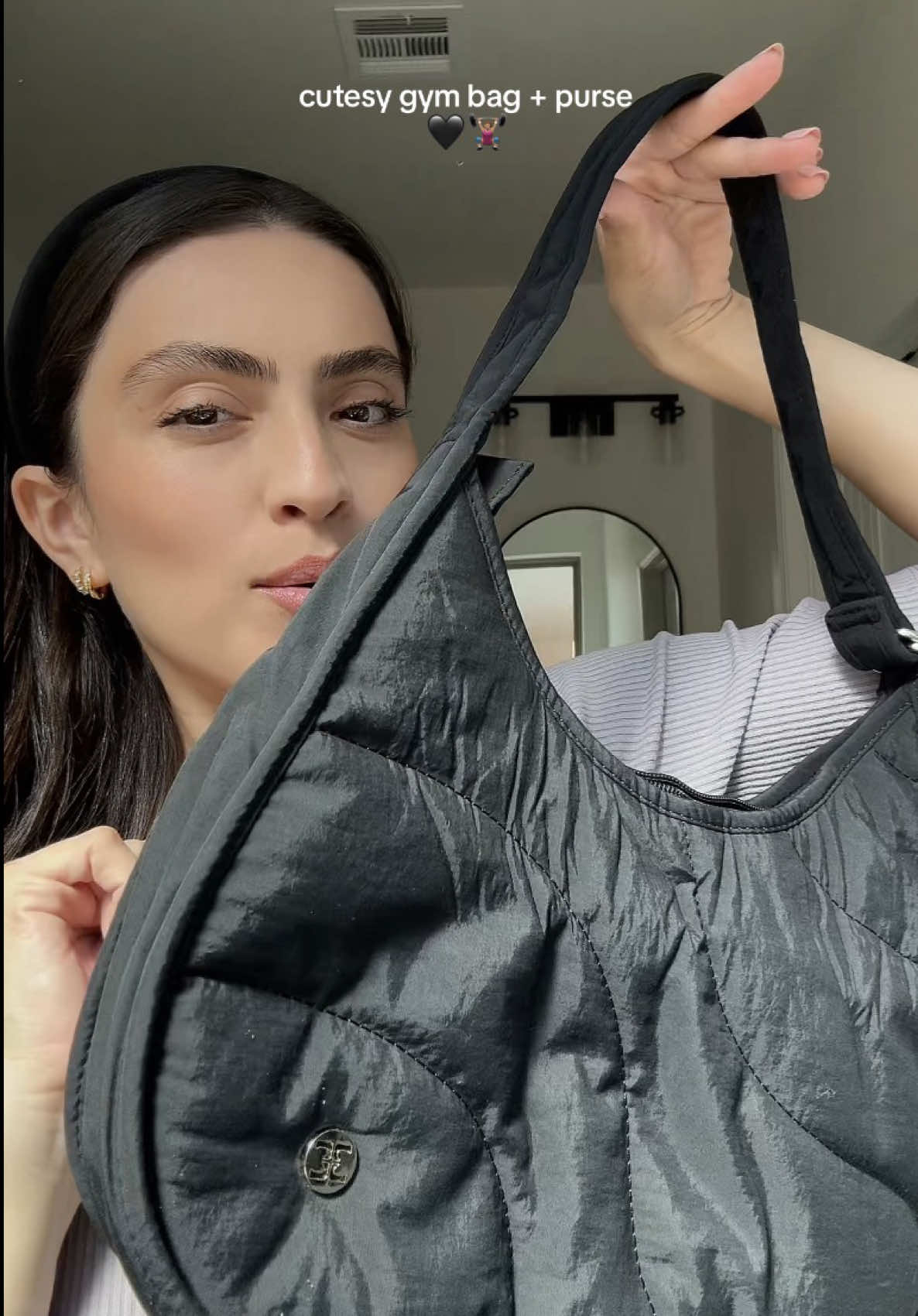 TikTok post by @nataliadmartnz for Affiliasi Pikaru. Caption reads: @telena_official 🖤✨ #blackpurse #tiktokshopfyp....