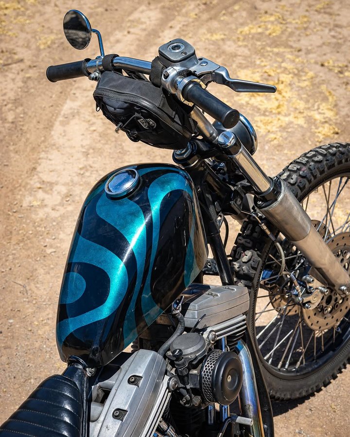 Instagram post by @chicken_fried_choppers for Biltwell. Caption reads: To me the essence of Harley Davidson is pushing....