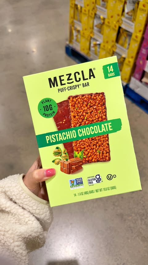Instagram post by @alwaysbemyfoodie for Mezcla. Caption reads: ✨COSTCO FINDS✨ The @eatmezcla Pistachio Chocolate....