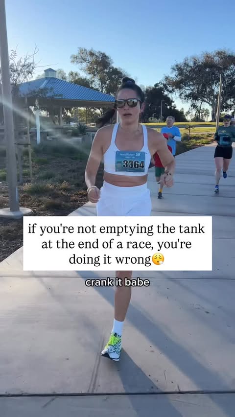Instagram post by @trackclubbabe for Mizuno USA. Caption reads: LEARN TO EMPTY THE TANK🔥

🔥Learn to lean into....