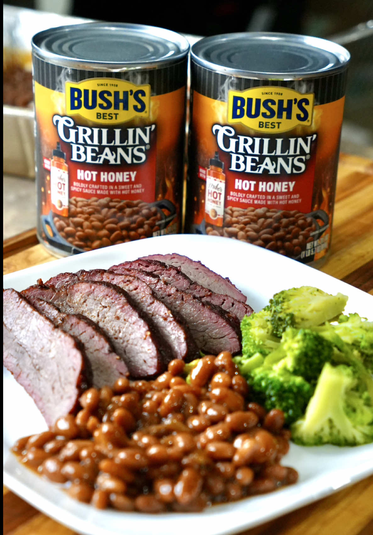 TikTok post by @holmescooking for Mike's Hot Honey. Caption reads: #BushsBeansPartner Your family and friends are....