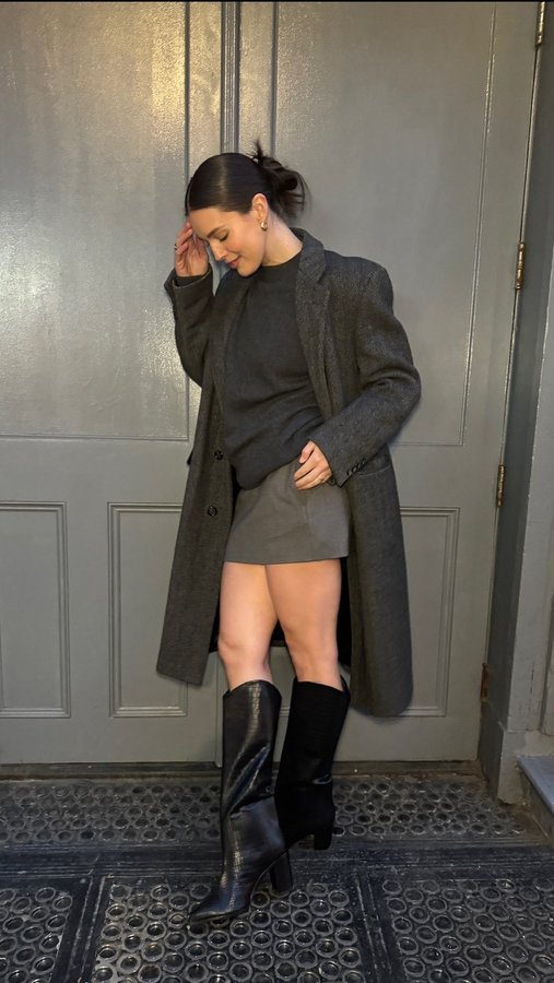 Instagram post by @emilydidonato for Schutz. Caption reads: These boots are made for #NYFW ✨ @Schutz #ad.