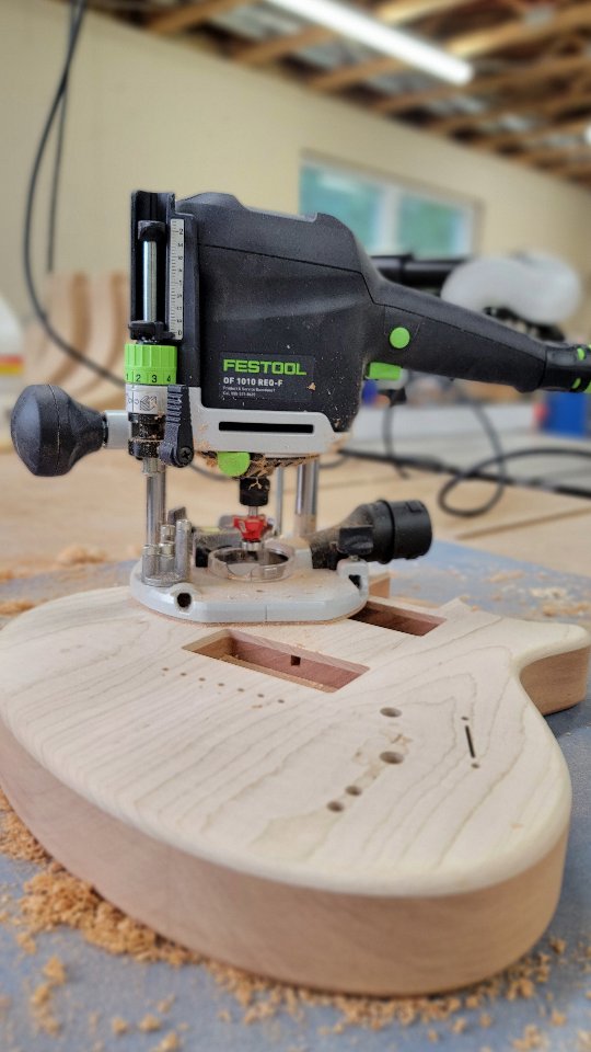 Instagram post by @woodshopmike for Festool USA. Caption reads: Adding the roundover on a guitar is easy in....