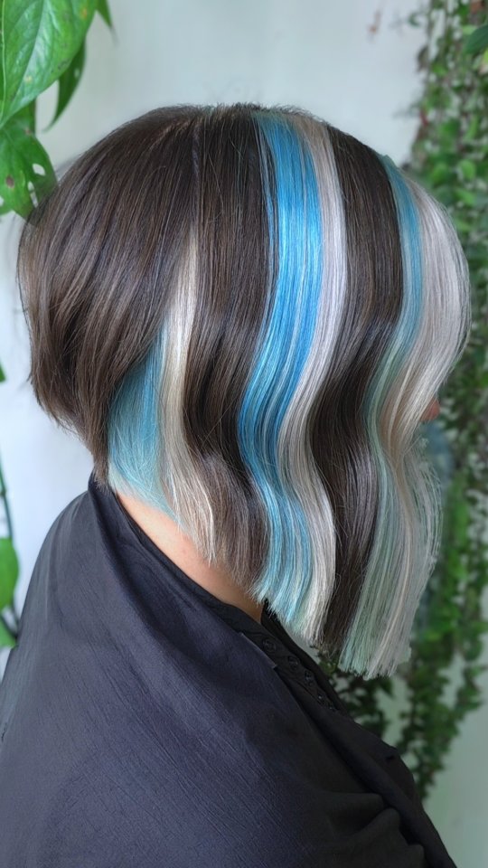 Instagram post by @jaymz.marsters for Biolage. Caption reads: Blue!! White!! Brown!! What a combo 💙🤍🤎

Let me....