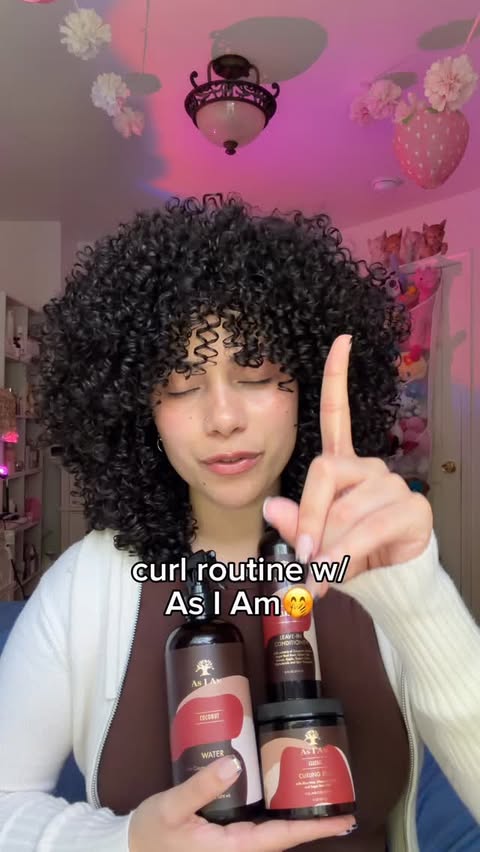 Instagram post by @love_elainne for As I Am. Caption reads: LOVE LOVE LOVE @asiamnaturally #curls....