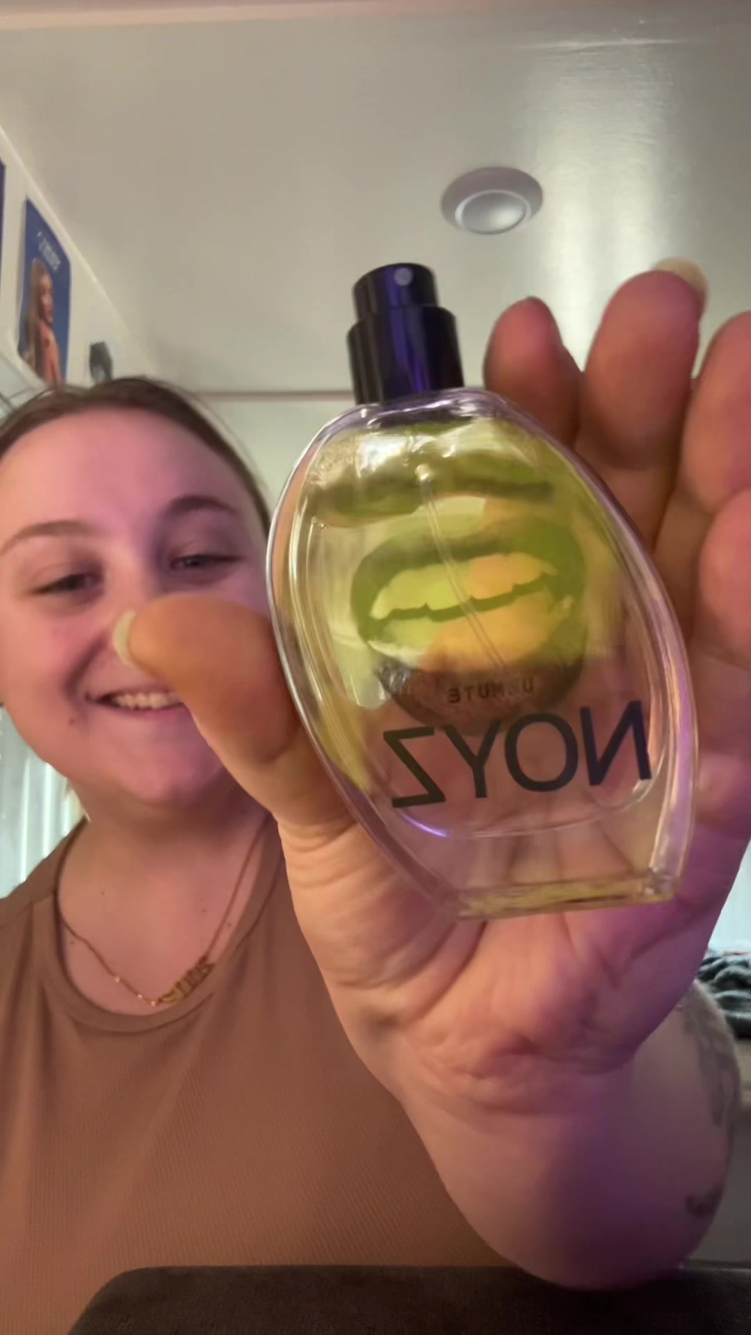 TikTok post by @elizabethnoakess for NOYZ. Caption reads: Thanks to @noyzfragrance for sending me this [...].