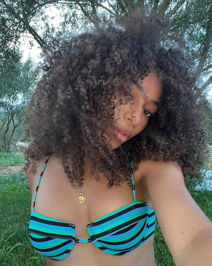 Instagram post by @jackyinberlin for Triangl. Caption reads: *anzeige living my island girl dream w// @triangl....