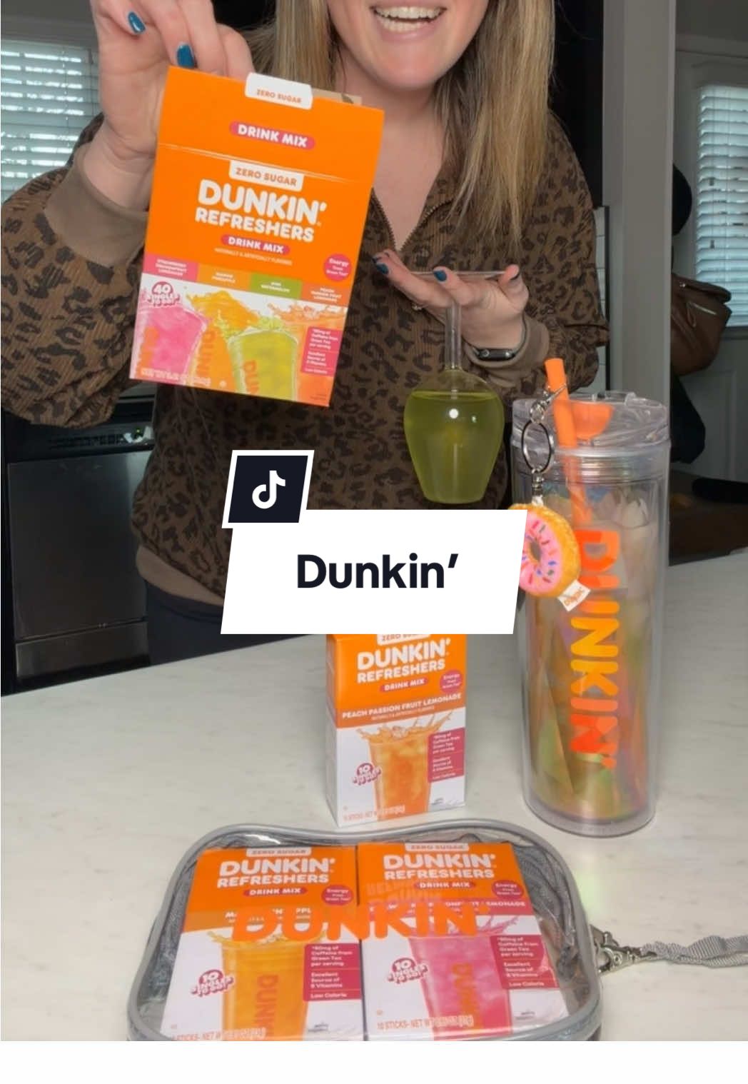 TikTok post by @thedailywith_kaylee for Singles To Go. Caption reads: [...] Grab before they’re gone! @Dunkin' @Singles....