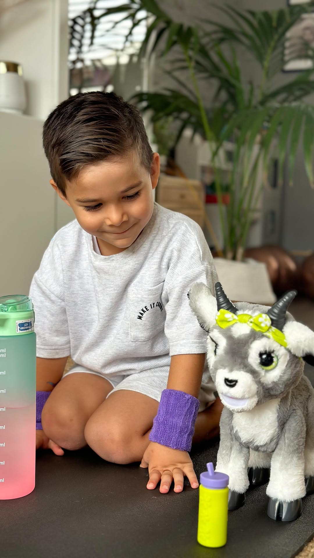 Instagram post by @mummysibel for Just Play. Caption reads: AD | Meet Daisy, our favourite Yoga Goat! 🧘‍♀️💚....