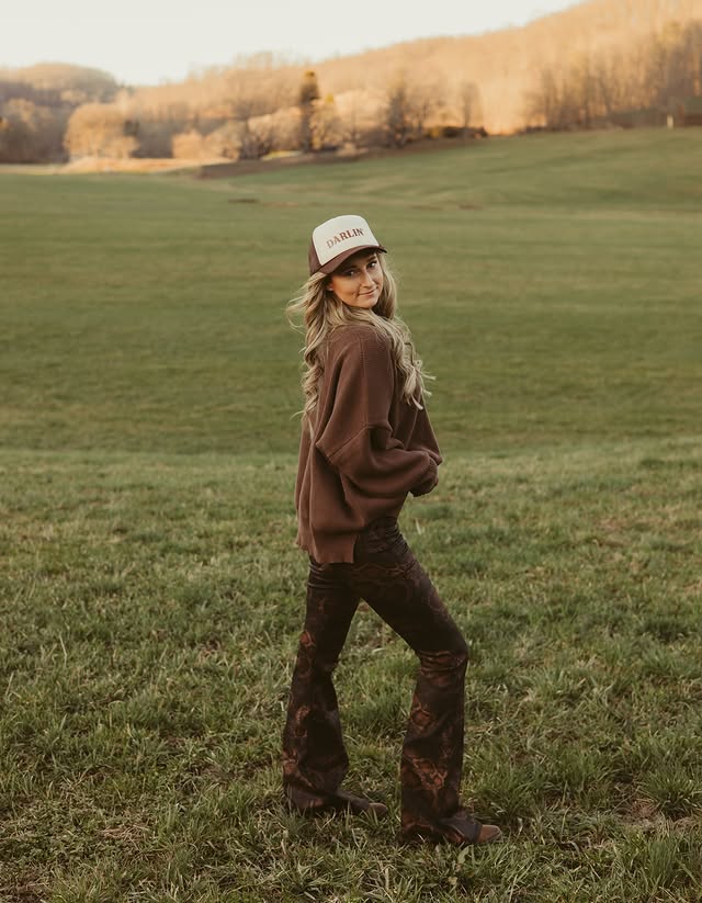 Instagram post by @allieann__ for Willow Boutique. Caption reads: These snakeskin flares are a statement piece. 🐍....